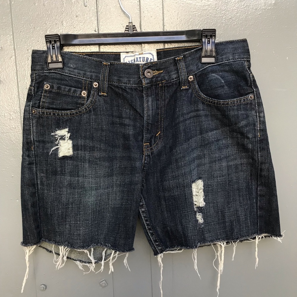 DIY distressed Levi jean shorts sz 29